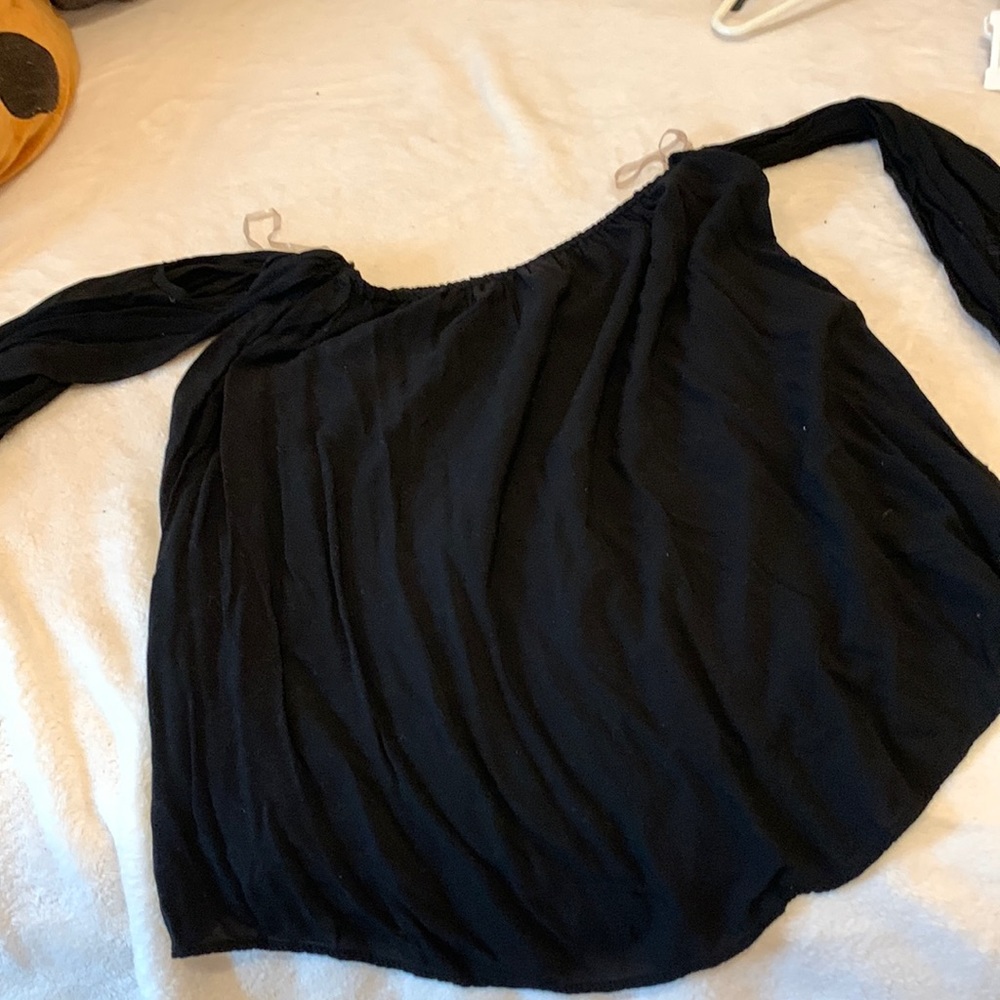 Previously loved black off the should top